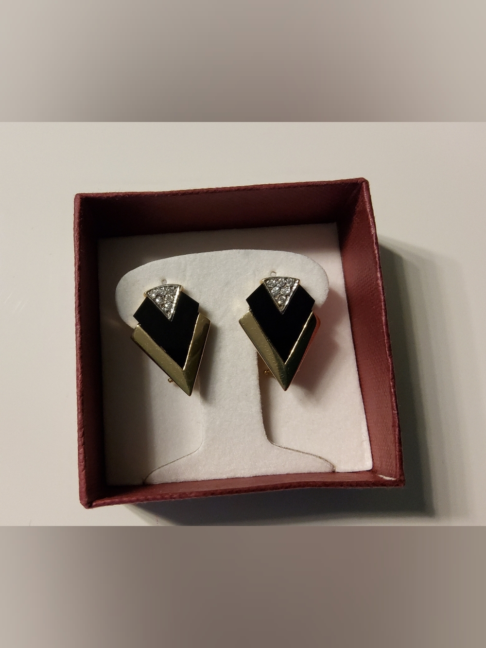 14K Yellow Gold, onyx, and diamond Art Deco–style clip-on/post earrings.